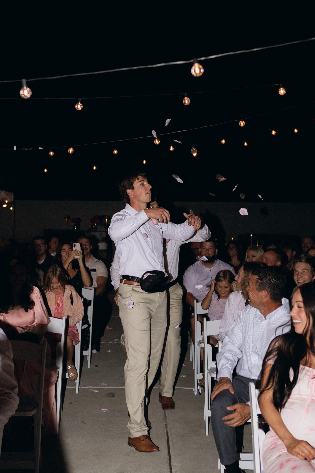Reception dance floor strung with market lights